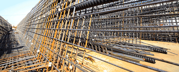 Gap Between Increases in Material Costs & Bid Prices Shrinks; Still Immense