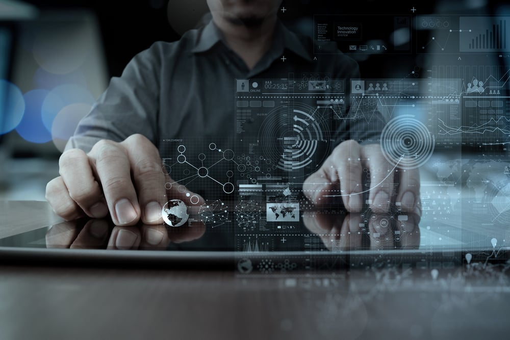 businessman hand working with modern artificial intelligence style technology digital tablet computer and graphics layer effect as business strategy concept