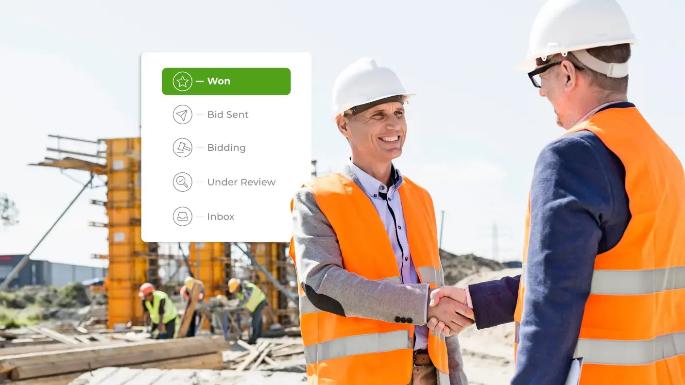 Construction employees shaking hands